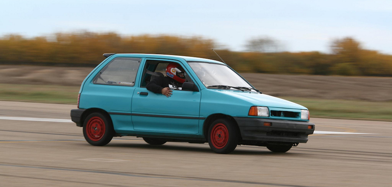 Illustration for article titled Ten Crap Cars That Are Somehow Amazing On Track